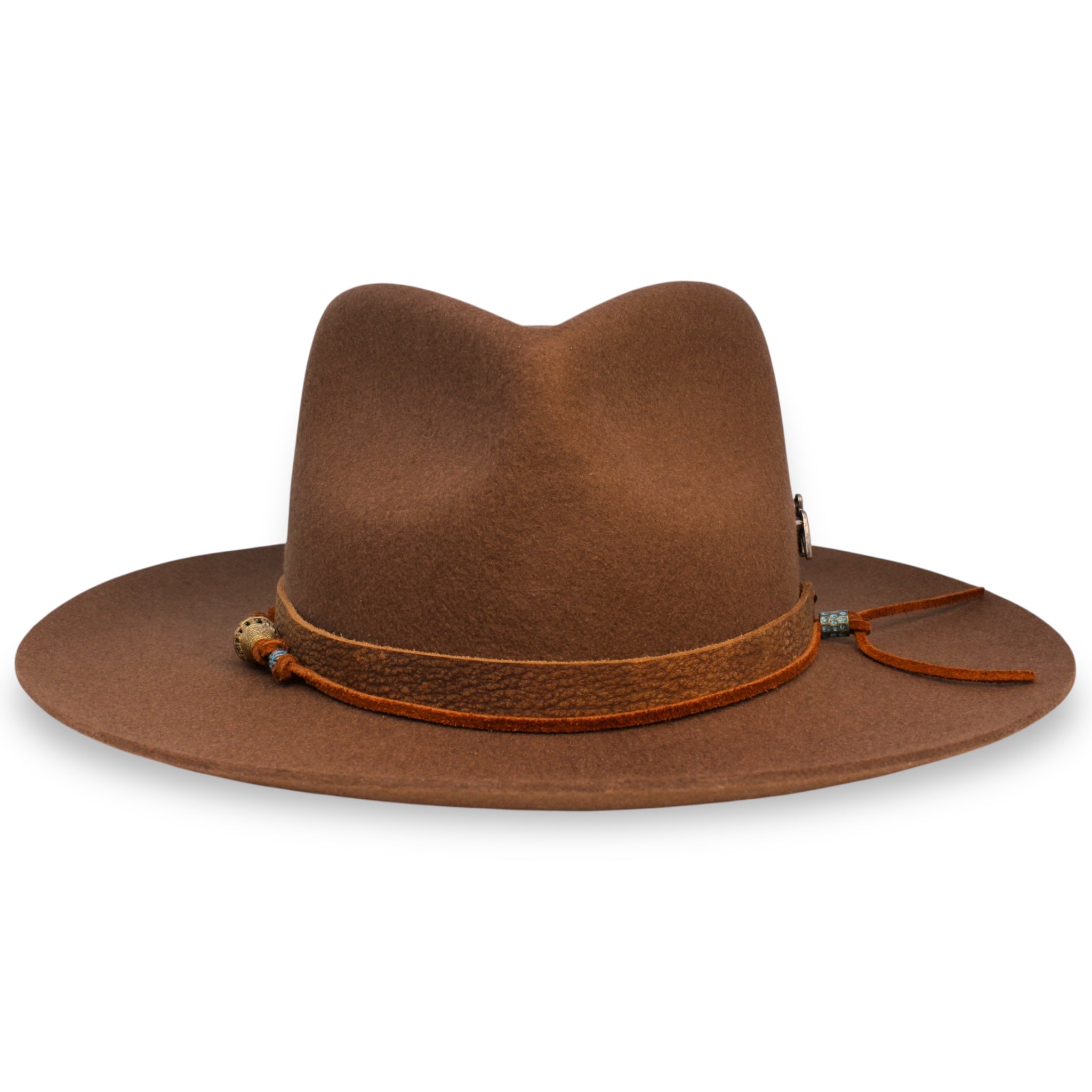 Front angle of a front pinch fedora showing off the textured brown leather band and the orange hat tie with brass and turquoise beads.