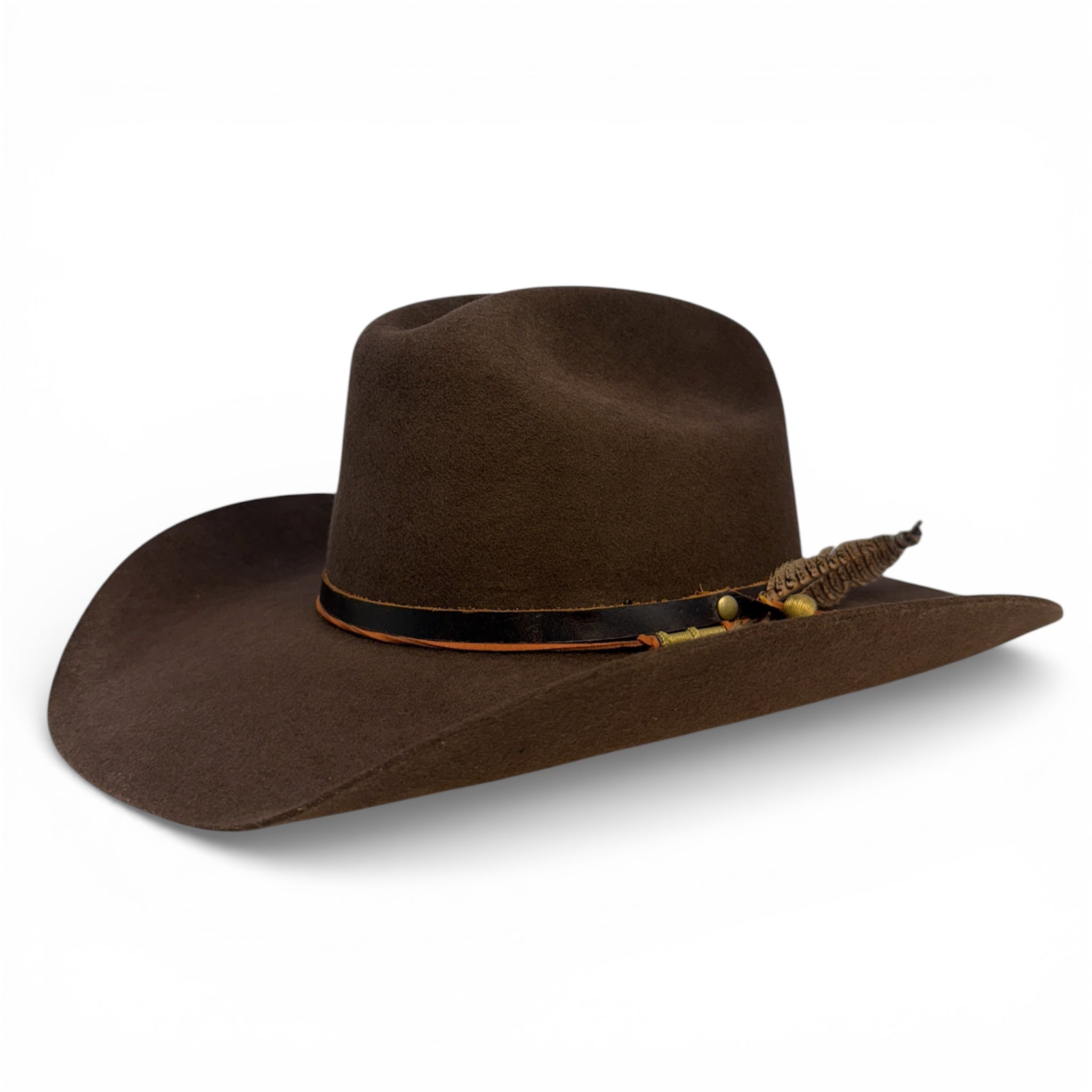 Handcrafted chocolate brown cowboy hat with a leather hat band, burnt orange leather hat tie, brass accents, and a pheasant feather crafted by House of Hatters.