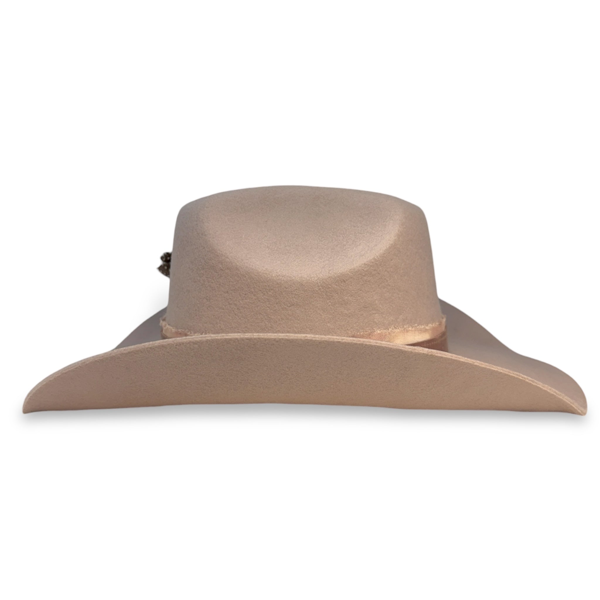 Opposite side view of a pale purple cowboy hat.