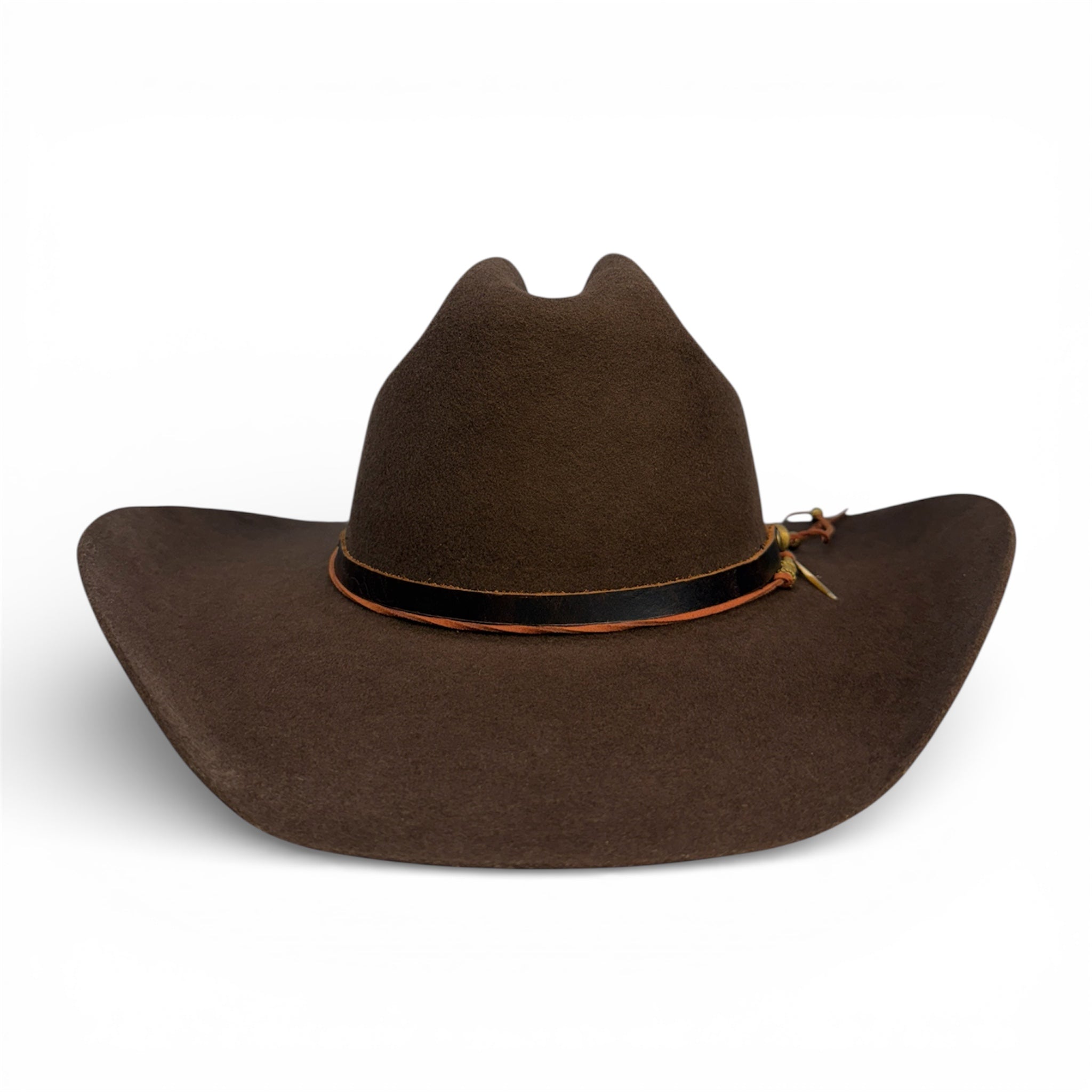 Front view of chocolate brown cattleman crown cowboy hat with leather hat band and burnt orange hat tie.
