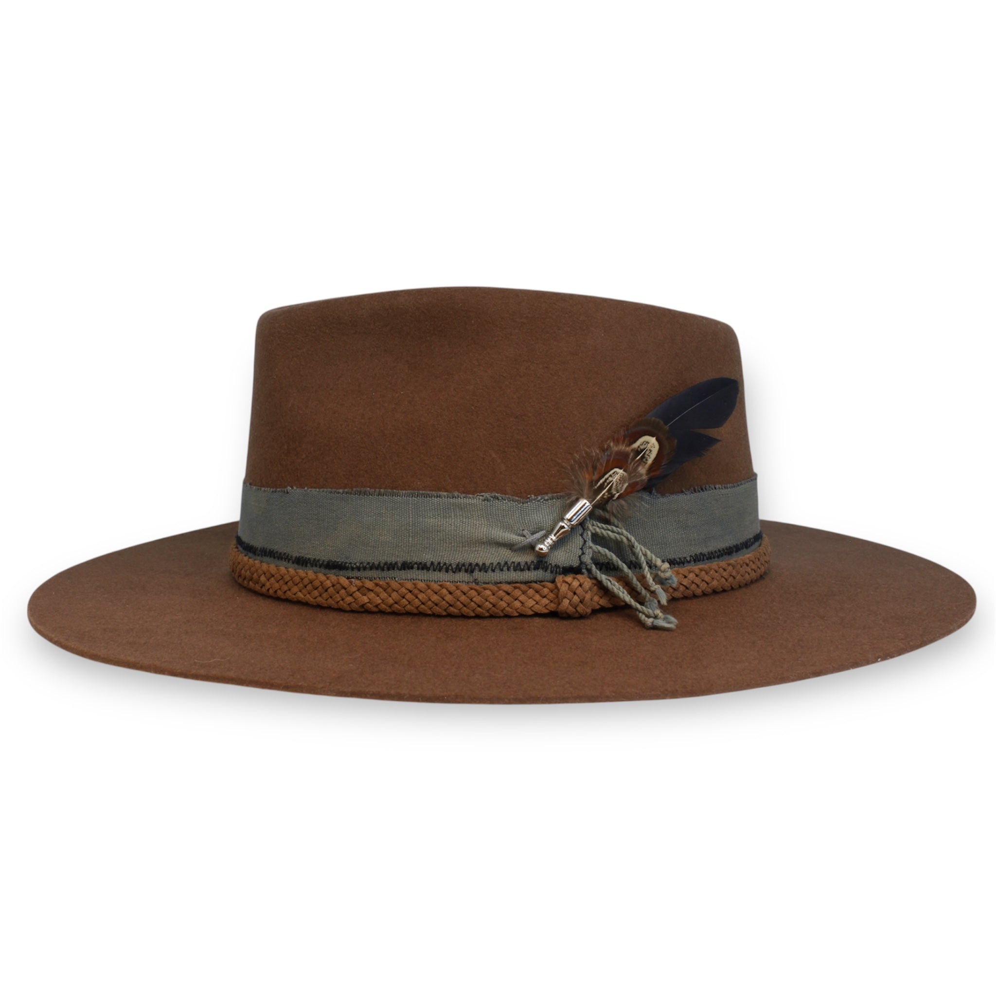 Side view of a brown fedora with a flat brim. The feathers are kept in a silver holder.