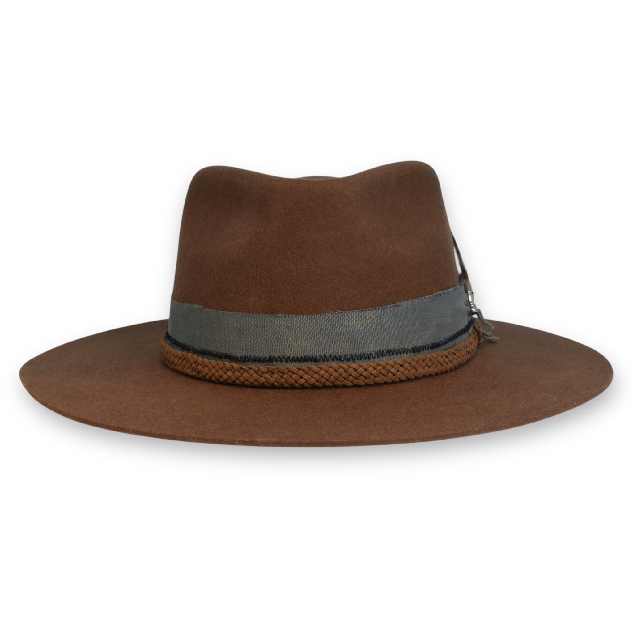 Front view of a brown fedora with a wide front pinch, grey textile, and brown braided cord.