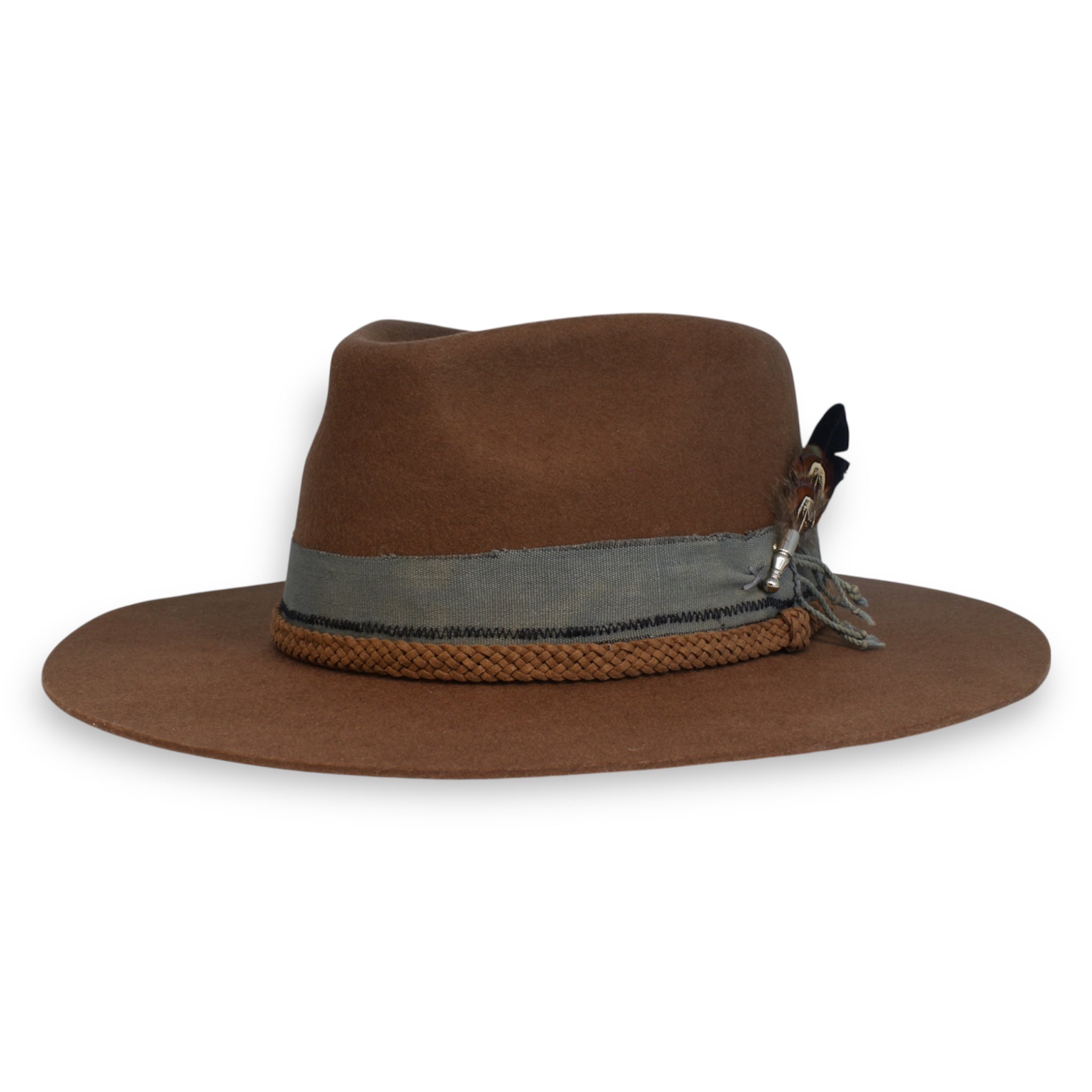 Brown fedora with a simple textile band, braided leather band, and feathers in a silver feather pin made by House of Hatters.