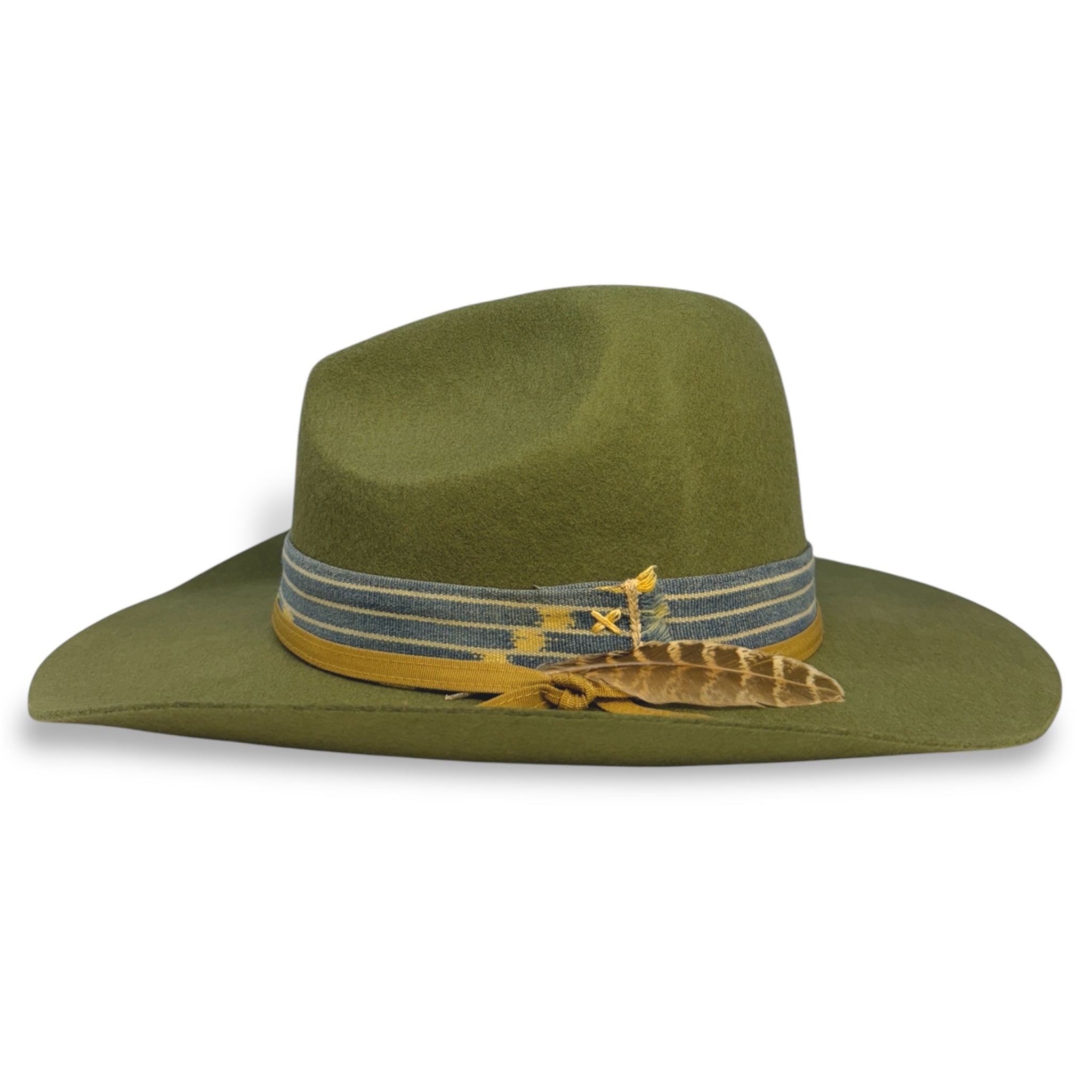 A side view of the felt Gus cowboy hat showing the unique shape of the hat and the small feather.