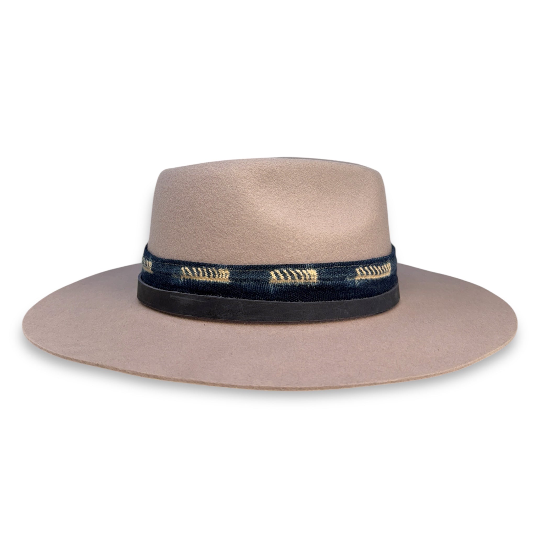 The opposite side view of a lavender fedora showing the texture of the hat and the textile.