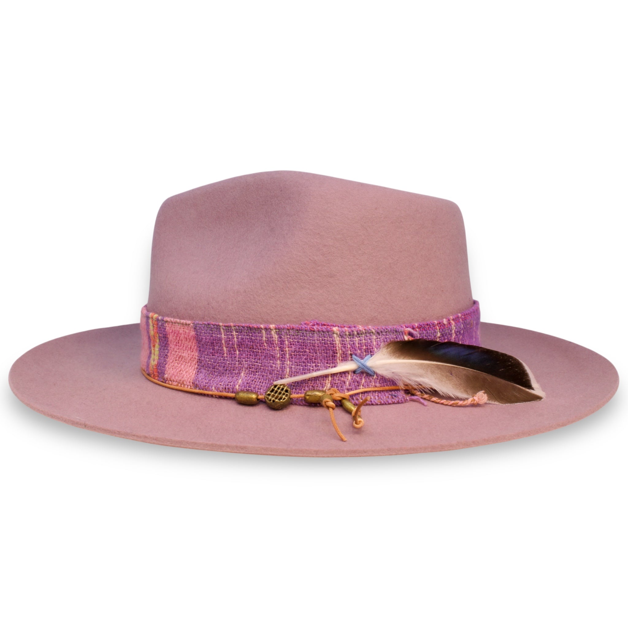 A fedora from the side showing the textiles, an orange hat tie with brass beads, and a white and dark brown feather with a blue sheen.