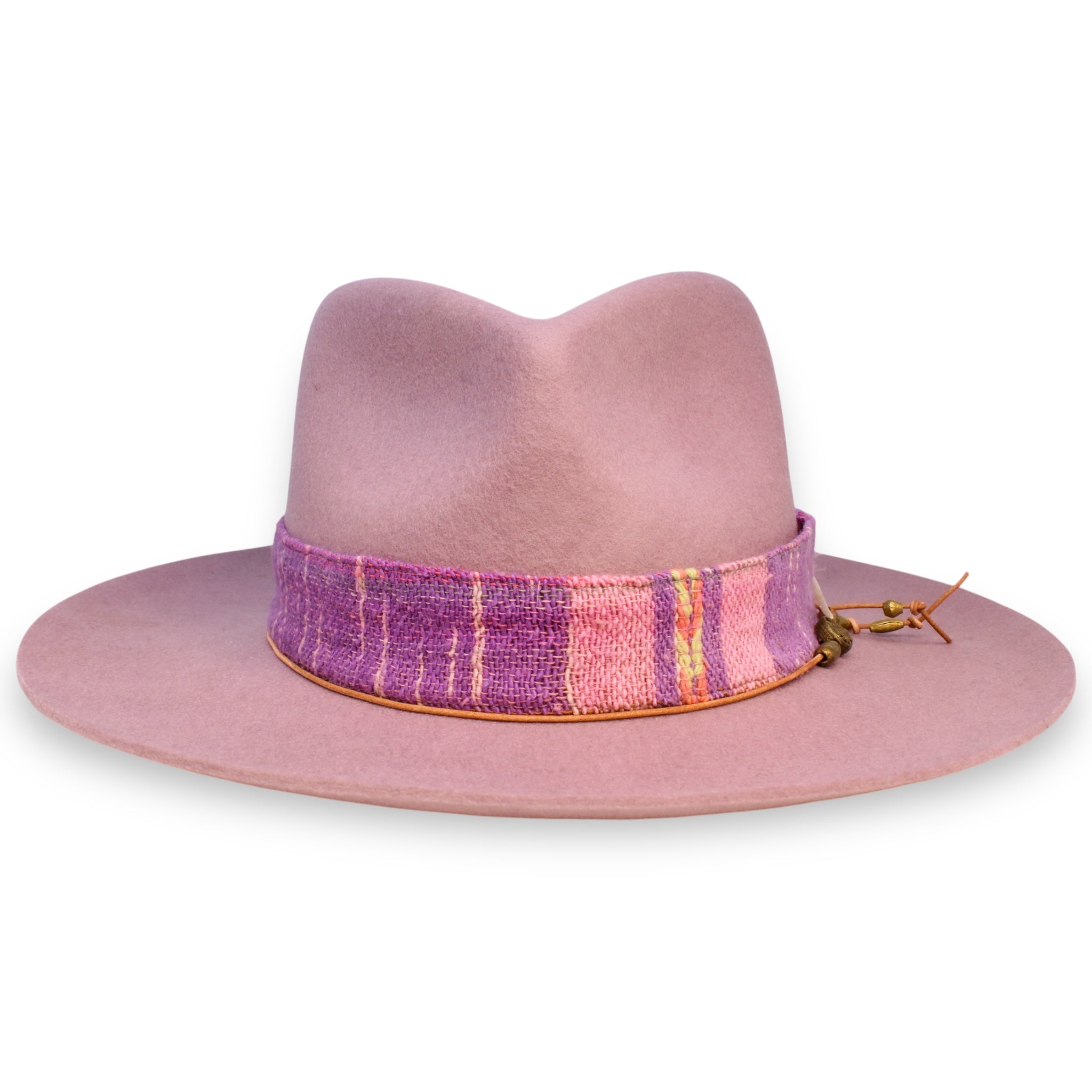 The front view of a front pinch fedora with a short, lifted brim accessorized with a pink and magenta textile band and an orange hat tie with brass beads.