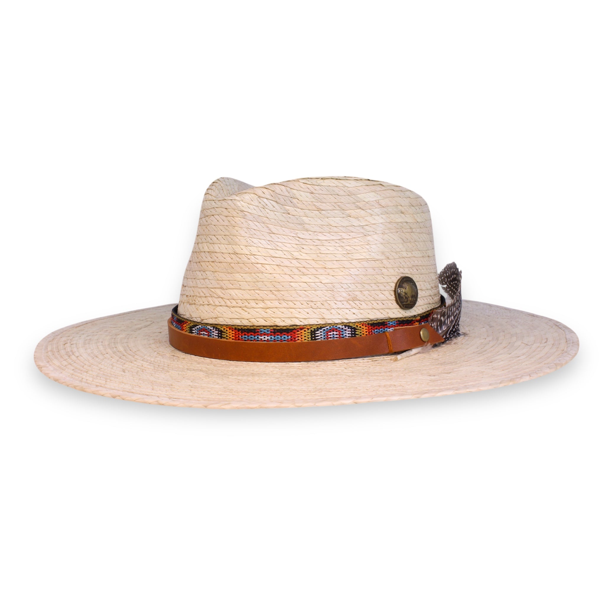 Palm fedora with Indigenous inspired ribbon, a leather hat band, a bronze concho, and a feather made by House of Hatters.