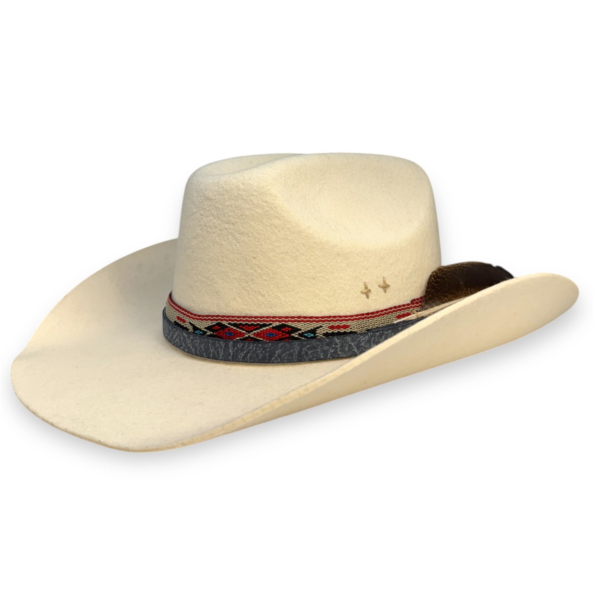 Beige cowboy hat with Native American inspired ribbon, a leather hat band, embroidered crosses, and a feather designed by House of Hatters.