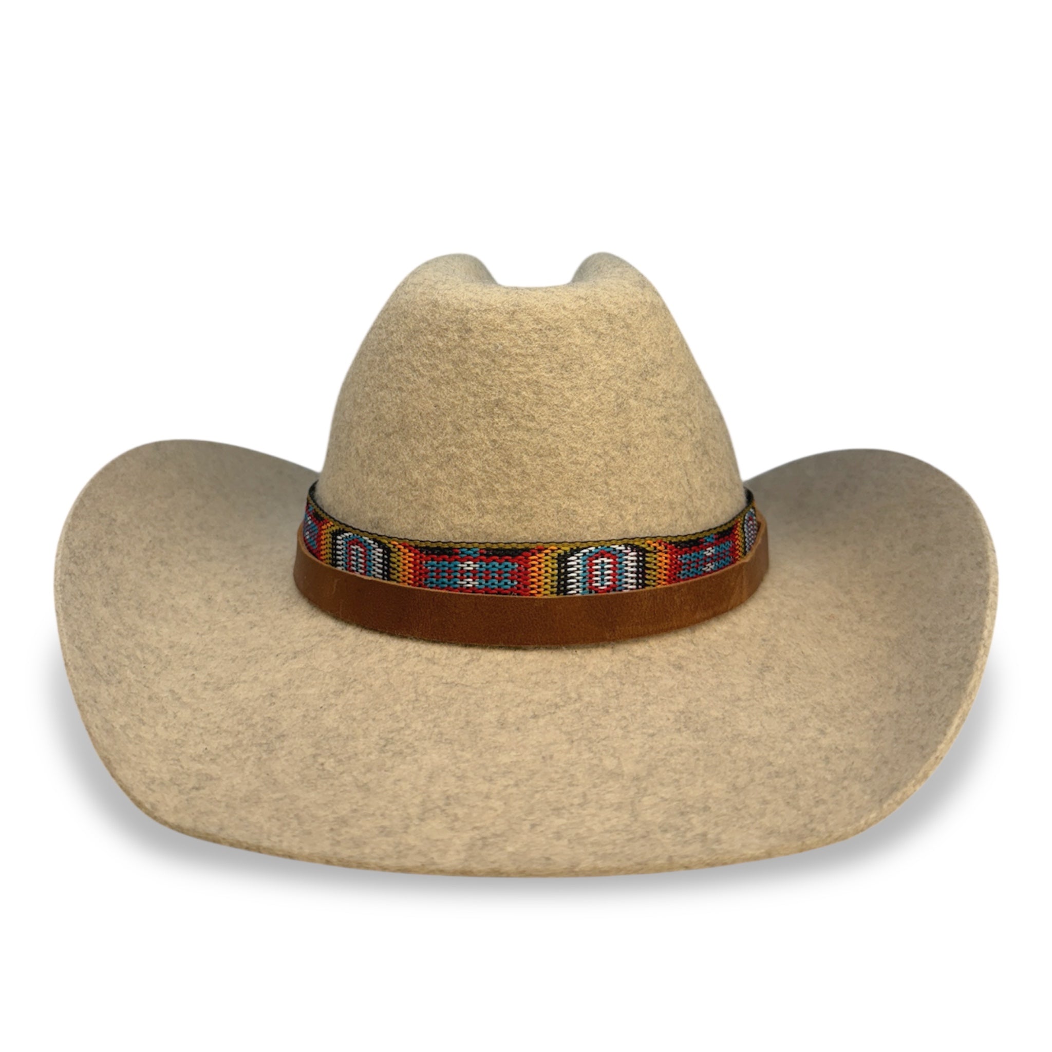 Front view of oatmeal colored cattleman crown cowboy hat with tan leather hat band and an indigenous style fabric ribbon.