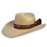 An oatmeal colored cowboy hat with a tanned leather hat band, multicolored ribbon band, and a large turkey feather made by House of Hatters.