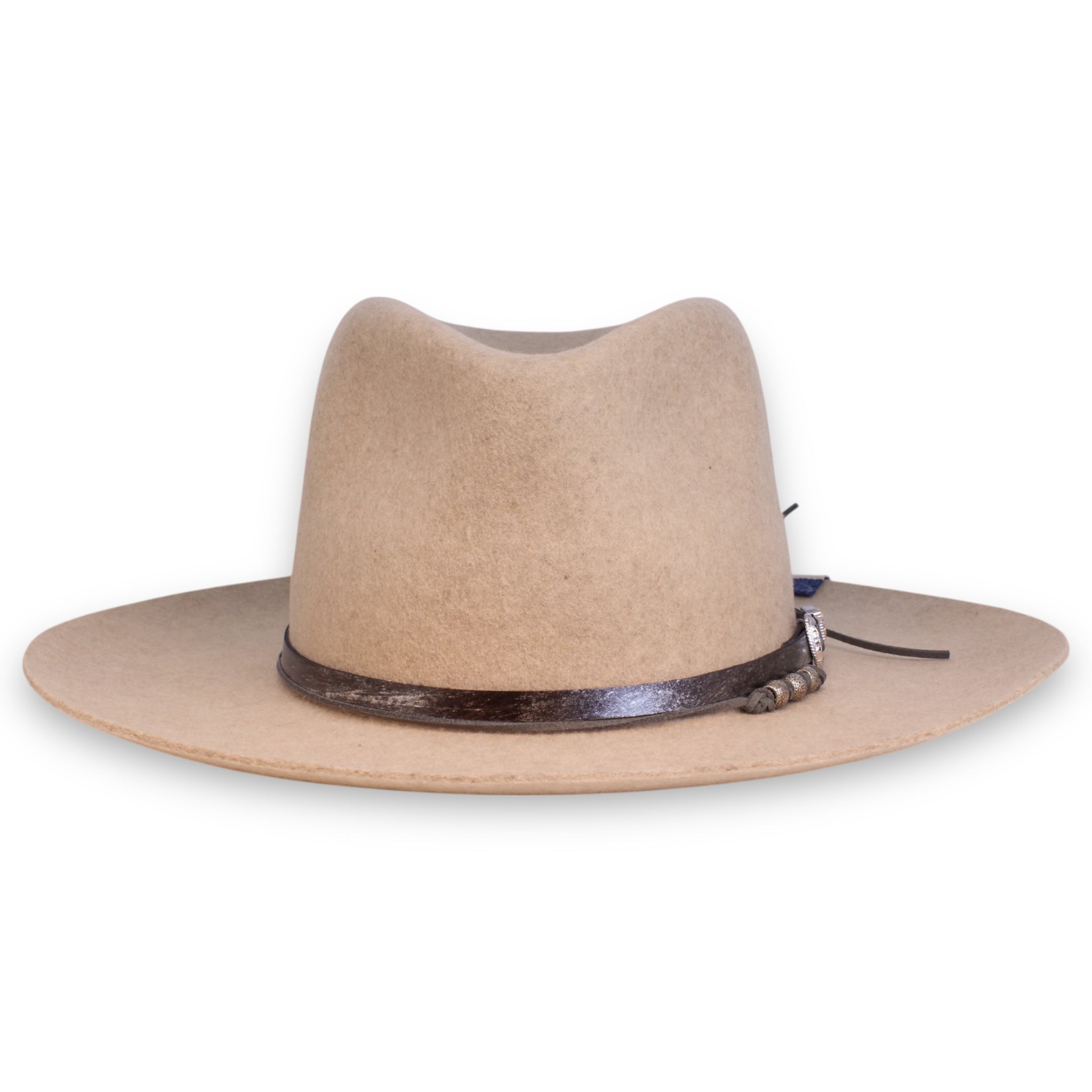 The front view of a front pinch oatmeal fedora featuring a handmade leather band and a silver beaded hat tie.