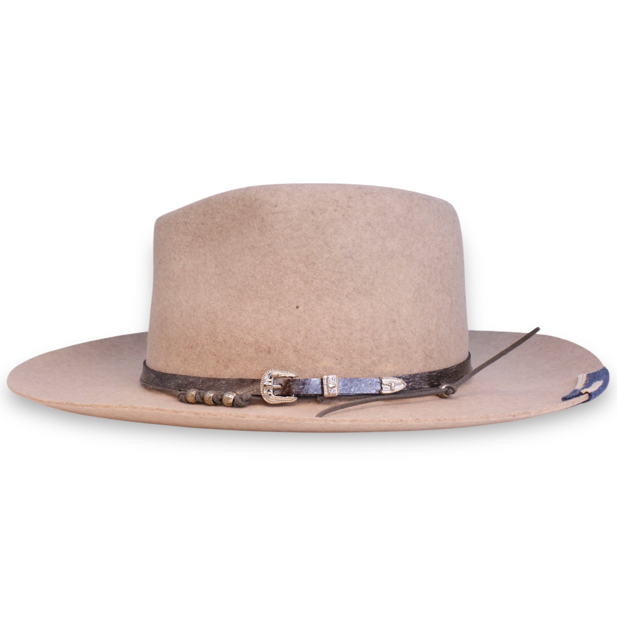 An speckled beige fedora with a handcrafted leather hat band with silver hardware. Three silver beads line the front of the crown.