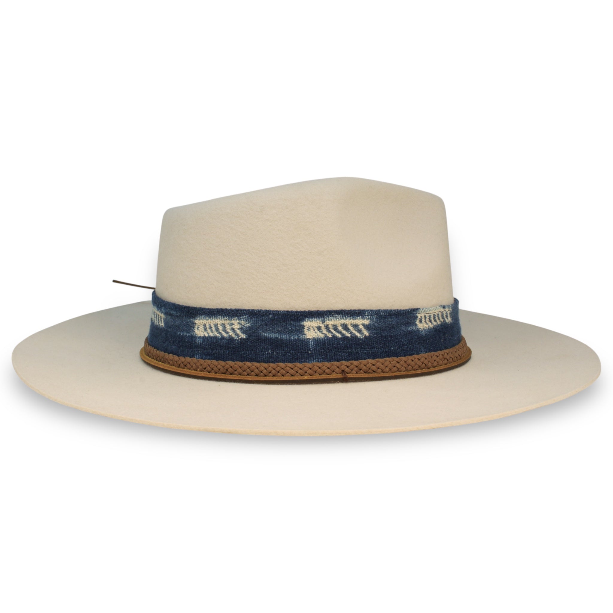The opposite side view of a white felt custom hat showing the variation in the textile and the leather hat tie.